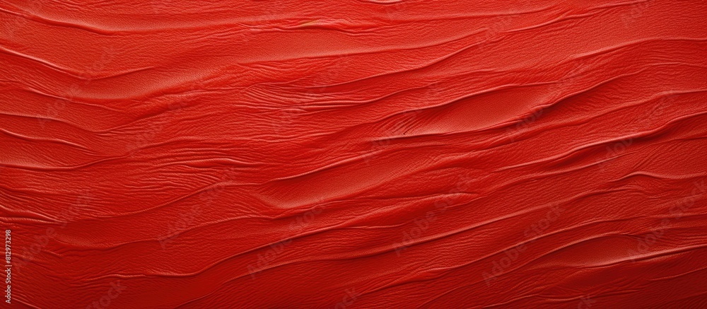 A red plastic background with a textured appearance Perfect as a copy space image A red plastic background with a textured appearance Perfect as a copy space image