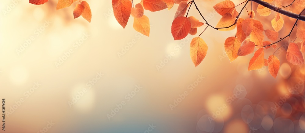 Obraz premium A fall themed background with orange leaves perfect for conveying the essence of autumn Offers plenty of copy space for your needs