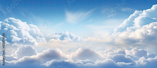 A captivating cloudscape with ornamental clouds and a dramatic sky illuminated by soft sunlight This panoramic image provides a perfect texture and background for graphic resources design or copy spa