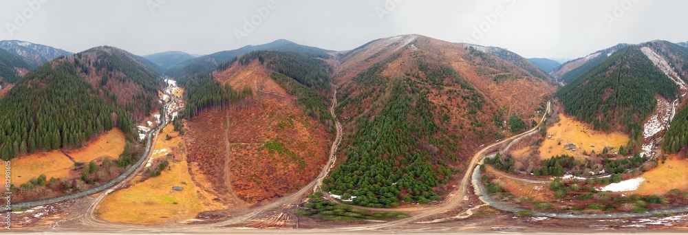 Carpathian forest clearing and an all-terrain vehicle tractor