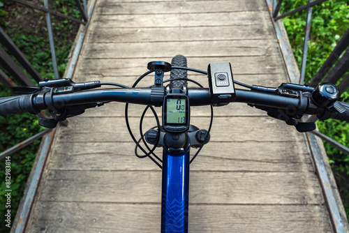 First-person view of the bicycle handlebars of a mountain bike mtb.