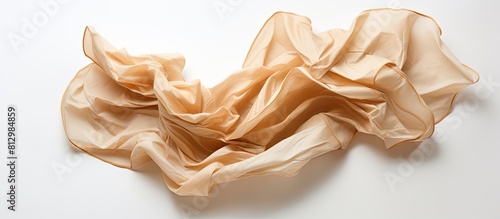 A copy space image featuring crumpled vintage paper set against a white background