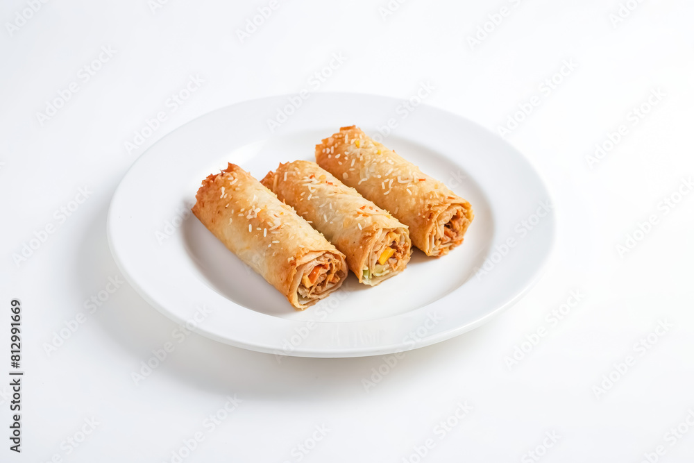 Golden Delight: Crispy Spring Rolls Served on a White Plate Golden Delight: Crispy Spring Rolls Served on a White Plate