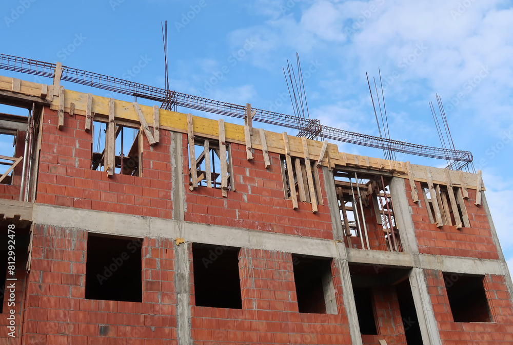 Unfinished building with blue sky
