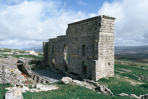 Remains of the ancient Roman theater of the city of Acinipo. Roman archaeological remains in the ancient city of Acinipo. photo