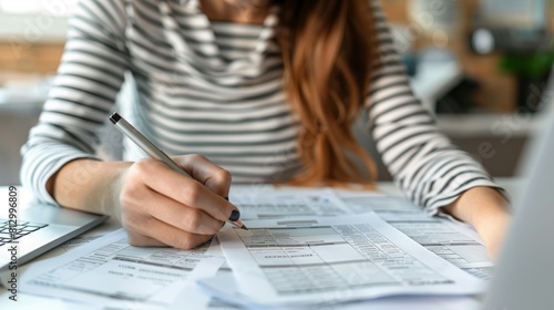Corporate and individual tax payment concept, woman using computer filling out corporate and personal income tax return, VAT and property tax of business.