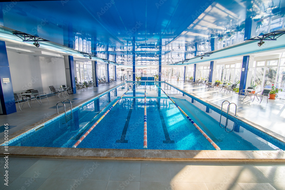 Fototapeta premium Spacious Indoor Swimming Pool in Hotel