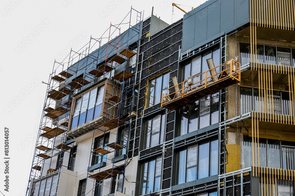 Close-up of the structural components of a high-rise multi-storey residential apartment building made of concrete blocks Close-up of the structural components of a high-rise multi-storey residential apartment building made of concrete blocks