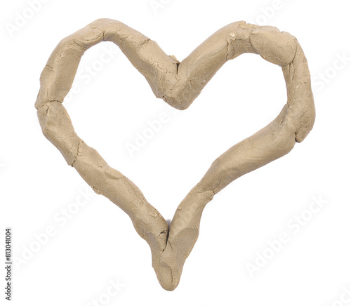 Modelling clay in shape symbol heart isolated on white background