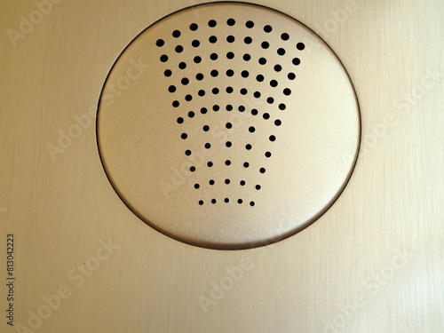 Metallic Intercom Speaker Close-up photo