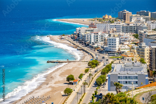 Fototapeta Naklejka Na Ścianę i Meble -  Aegean beach with sunshades in city of Rhodes (Rhodes, Greece)