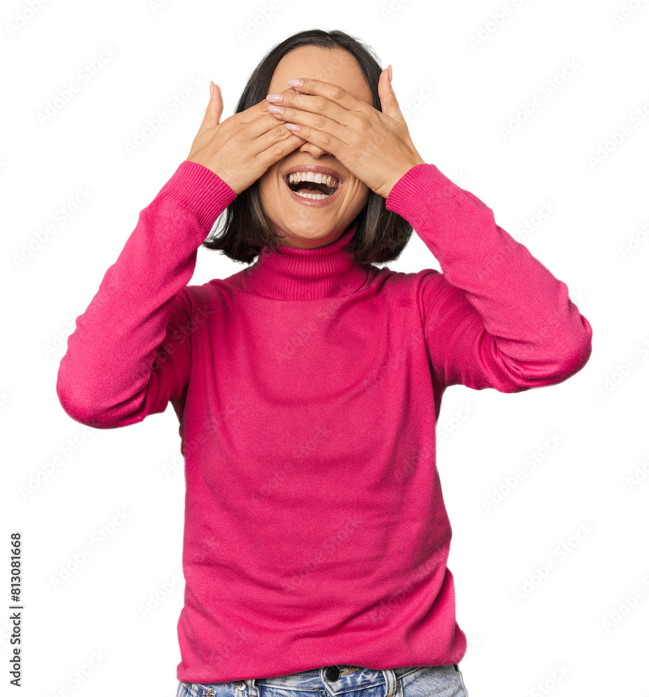 Young Caucasian woman with short hair covers eyes with hands, smiles broadly waiting for a surprise. Young Caucasian woman with short hair covers eyes with hands, smiles broadly waiting for a surprise.