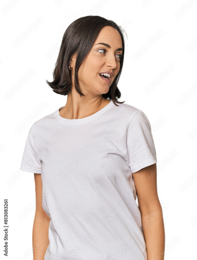 Young Caucasian woman with short hair looks aside smiling, cheerful and pleasant. Young Caucasian woman with short hair looks aside smiling, cheerful and pleasant.