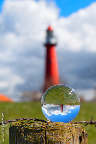 Red lighthouse in glass bowl Holland