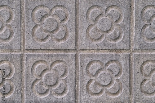 Background with Barcelona panots or Barcelona flowers, typical modernist tiles of the pavement on Barcelona streets
