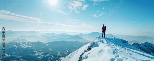 A back view of the hiker in the top of the moutain in the winter landscape. Viewpoint Above The Fog