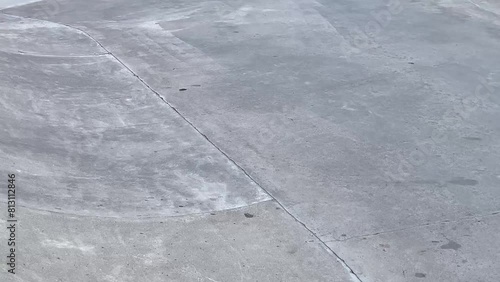Public playground for a skateboard in a recreation park. No people.