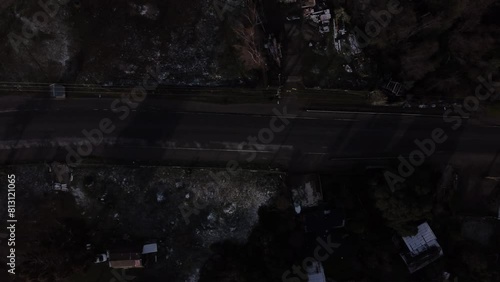 Aerial view of a road with cars with a light snowfall over the city of Bariloche, Patagonia Argentina. photo
