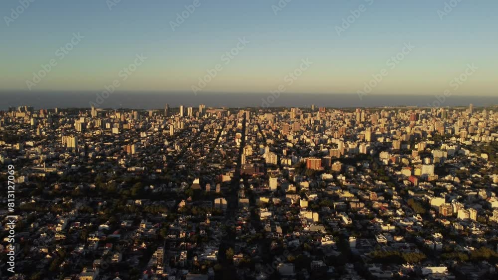 Wide aerial shot of sunset or sunrise of a city with red twilight sky Wide aerial shot of sunset or sunrise of a city with red twilight sky