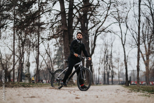 Confident business entrepreneur on a bike, enjoying a ride in the park with an eco-friendly commute.