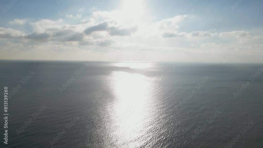 Heavenly beautiful ocean scenery of the sun shining through the clouds. Heavenly beautiful ocean scenery of the sun shining through the clouds.