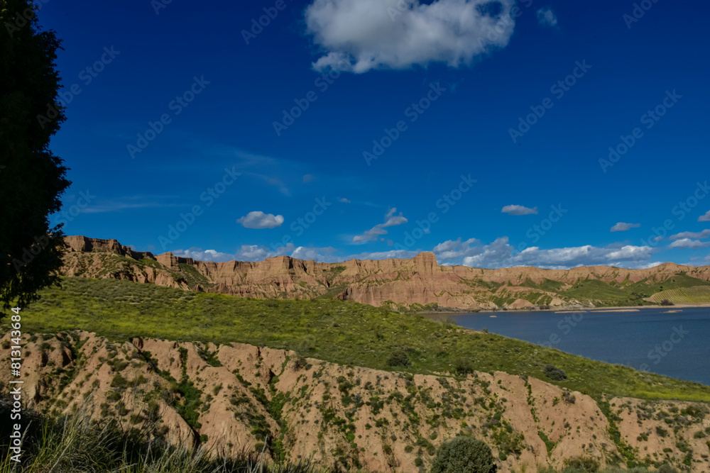 Naklejka premium photographs of beautiful landscapes with lagoons and white clouds,