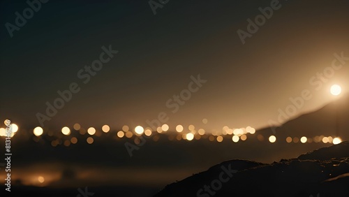 City lights glowing on hill at night photo