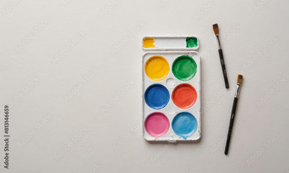 Watercolor paint circles pallette on paper texture art with copyspace background Watercolor paint circles pallette on paper texture art with copyspace background