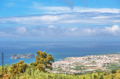 View on mountains, valleys, sea coastline of Sao Miguel island