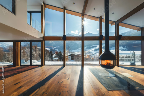 Contemporary Modern Empty Home with modern fireplace and view over snowy mountains
