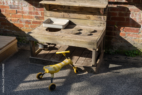 toddler trolley and wooden kitchen photo