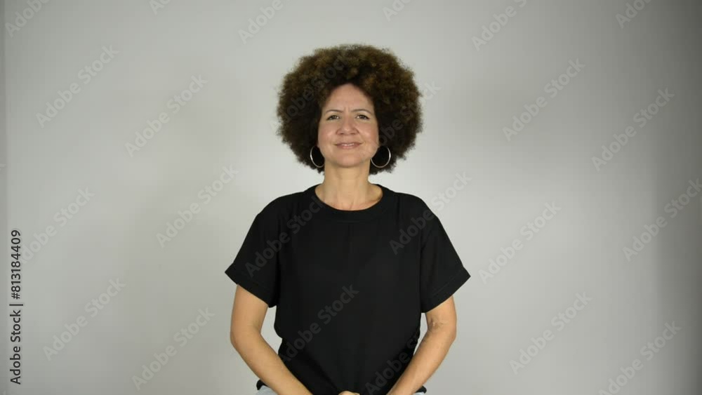 Female interpreter saying friendship is fundamental in Brazilian sign language. Female interpreter saying friendship is fundamental in Brazilian sign language.
