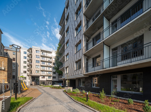 Courtyard and fasade of a modern residential house in a European city.