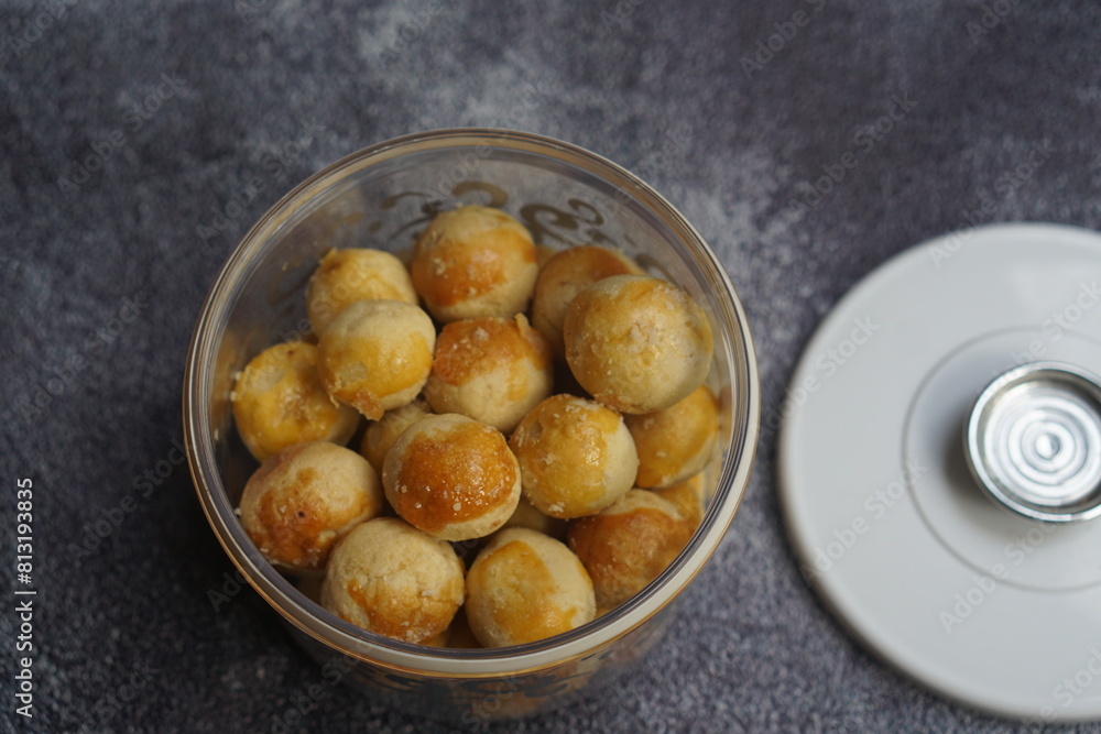 Nastar Cookies, Pineapple tarts or nanas tart are small, bite-size pastries filled or topped with pineapple jam, commonly found when Hari Raya or Eid Al Fitr or Lebaran. Selective focus. Nastar Cookies, Pineapple tarts or nanas tart are small, bite-size pastries filled or topped with pineapple jam, commonly found when Hari Raya or Eid Al Fitr or Lebaran. Selective focus.