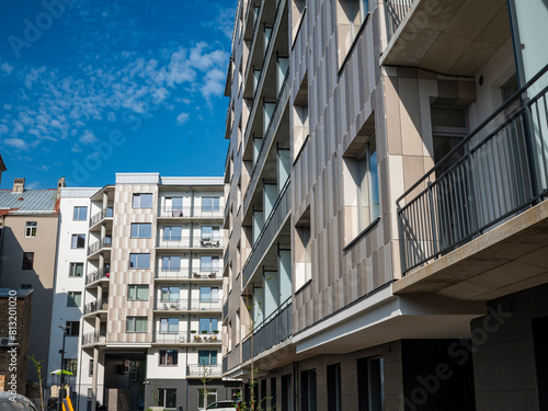 Courtyard and fasade of a modern residential house in a European city.