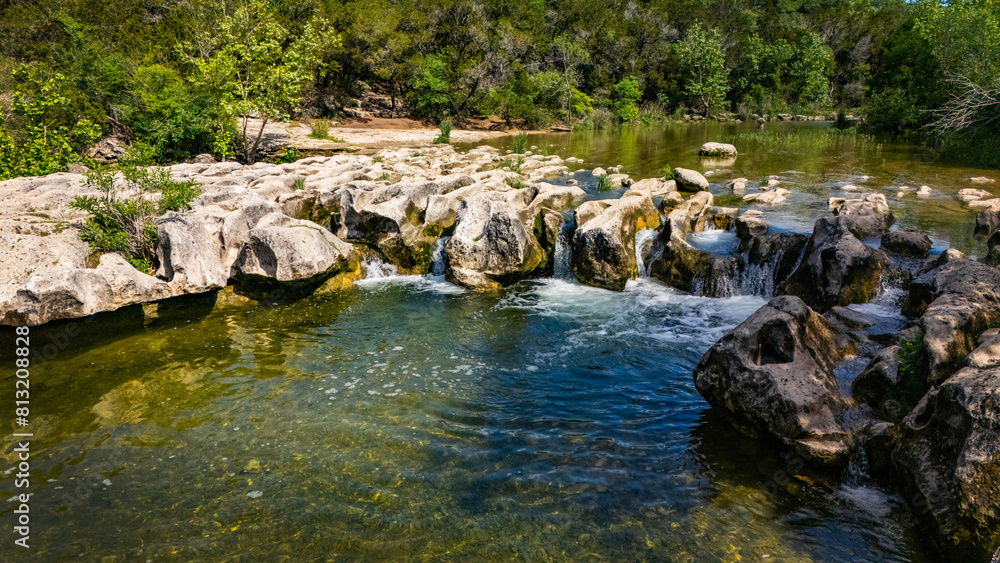 Scenic aerial view of Sculpture Falls via Barton Creek Greenbelt Trail