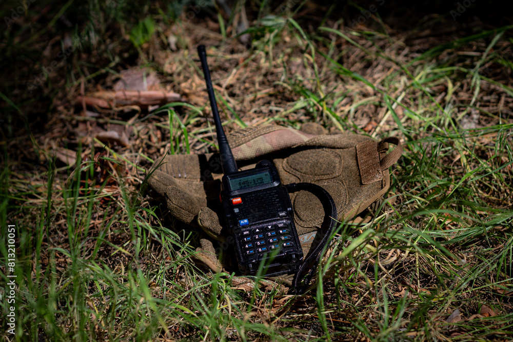 Military gear, tactical gloves and a walkie-talkie.
Individual protection of the military, tactical equipment. Military gear, tactical gloves and a walkie-talkie.
Individual protection of the military, tactical equipment.