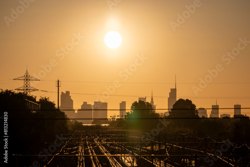 Urban Awakening: Cityscape by the Tracks