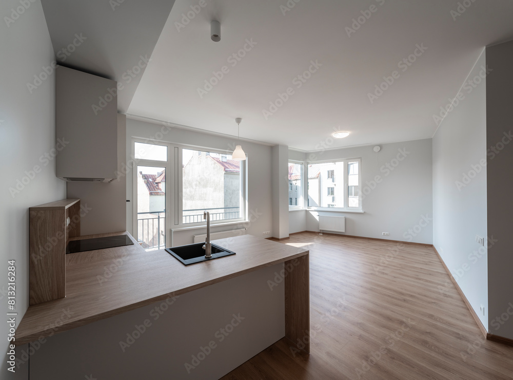 The interior of an apartment in a modern residential building in a European city. The interior of an apartment in a modern residential building in a European city.
