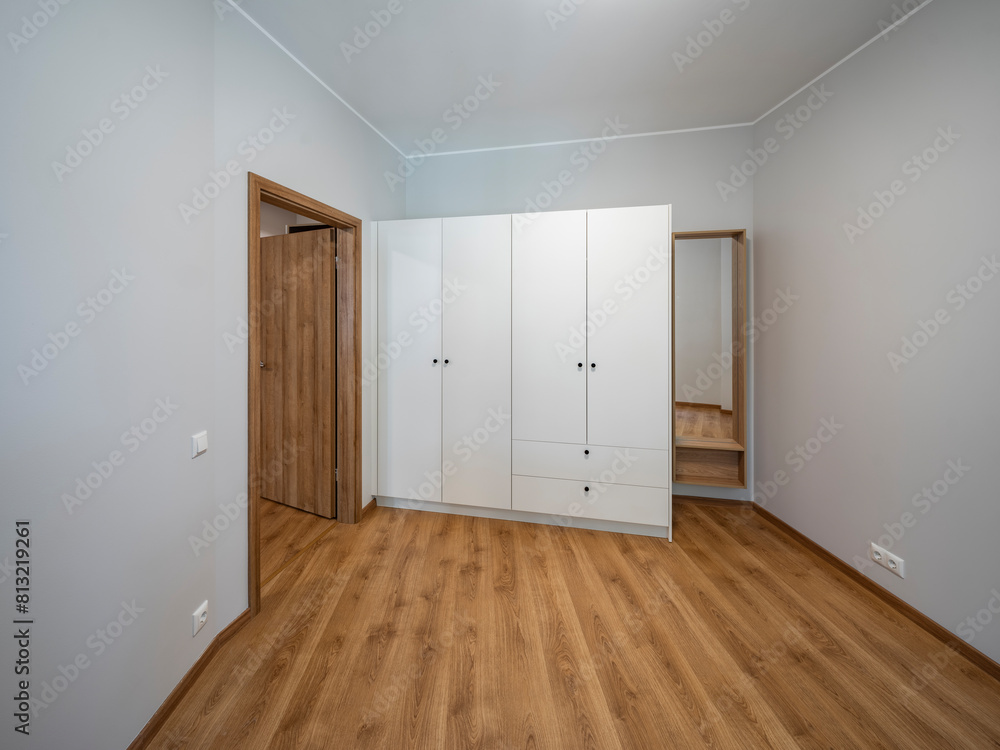 The interior of an apartment in a modern residential building in a European city. The interior of an apartment in a modern residential building in a European city.