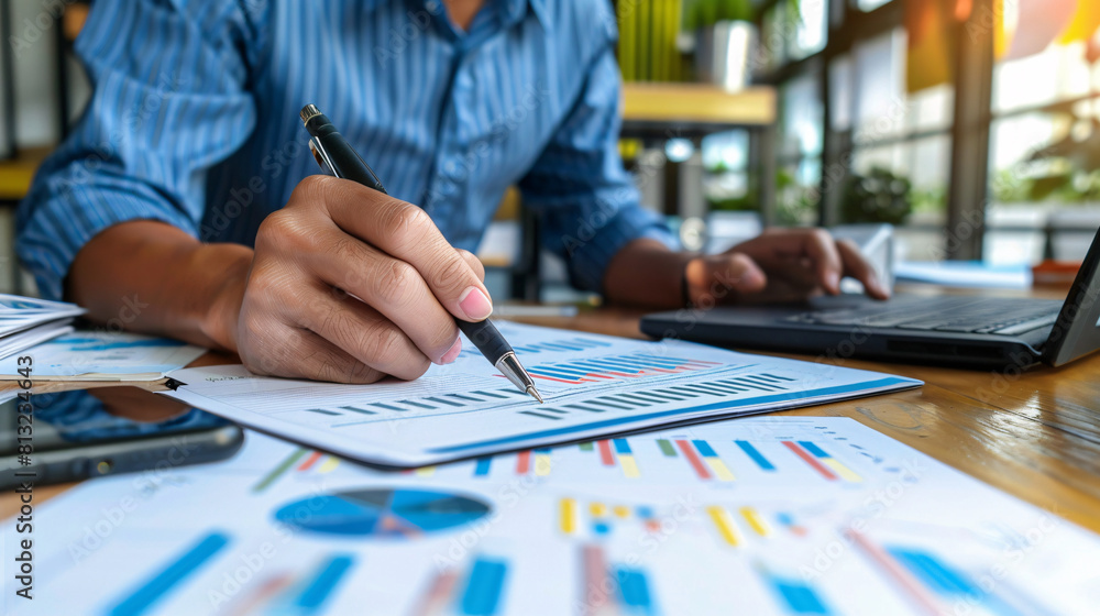 bussines man work pen paper laptop wealth management strategies in client meeting bussines man work pen paper laptop wealth management strategies in client meeting