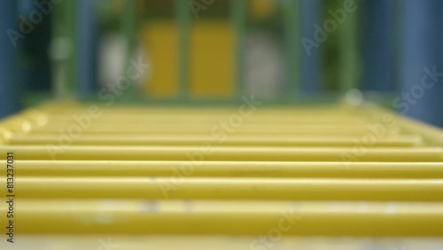 遊具の黄色い横パイプ photo
