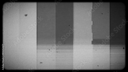 Black and white television screen with bars, static and glitch effects, dusty and noise textures and old style frame photo