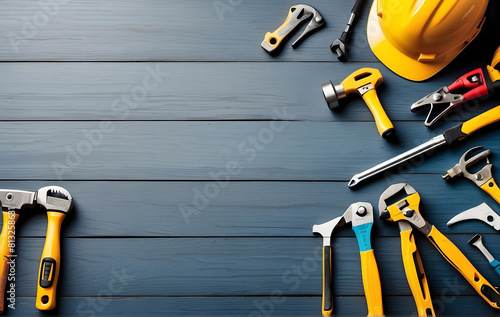 Labor day theme background concept. Flat layer arrangement of construction tools with enough copy space