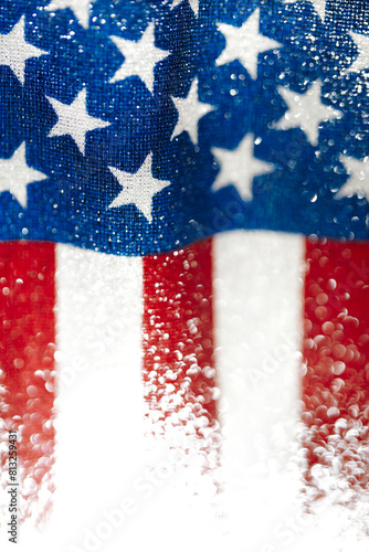 Sparkling red, white, and blue abstract background. USA background or American flag poster for 4th of July, Memorial Day, Veteran's Day, or other patriotic event. © Leigh Prather