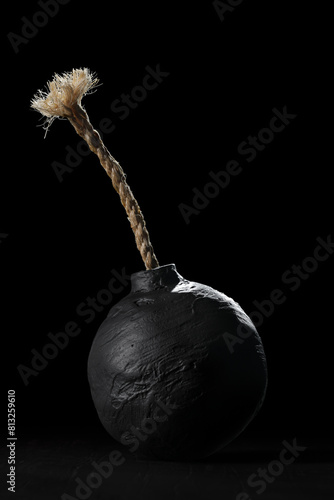 Round black bomb with fuse. Symbolizing fear, crisis, or dangerous violence. © Leigh Prather