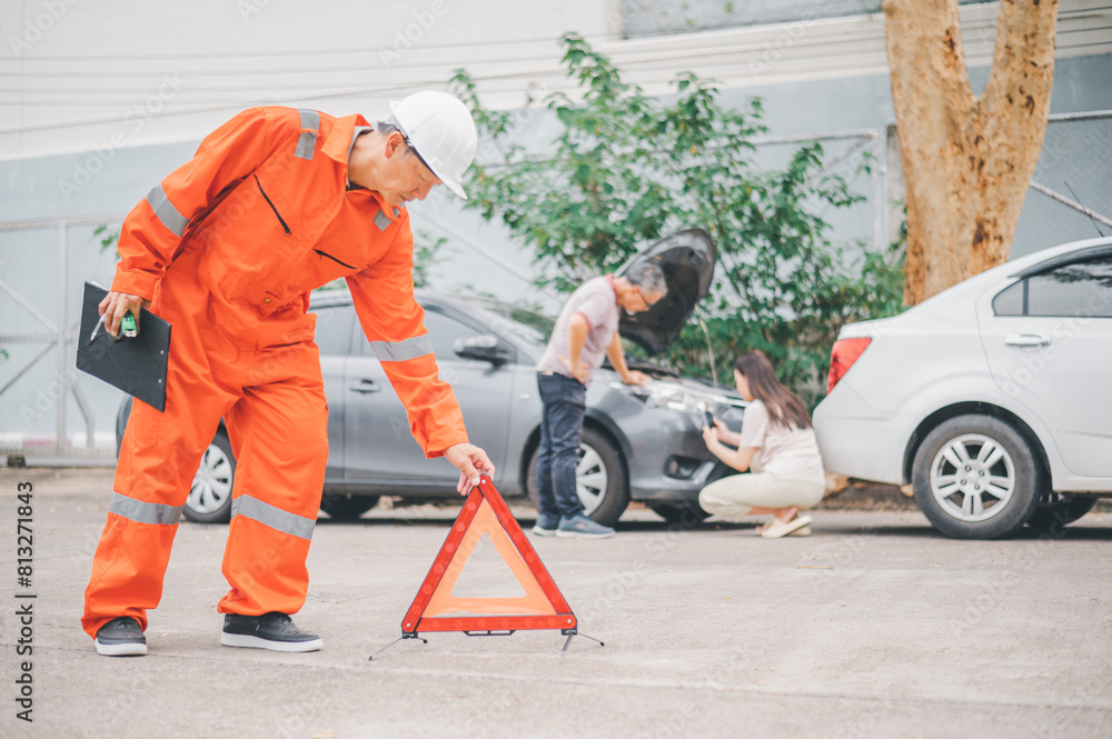custom made wallpaper toronto digitalInsurance officers hold a red emergency triangle sign on the road to indicate that there is an accident or car breakdown on the road ahead.