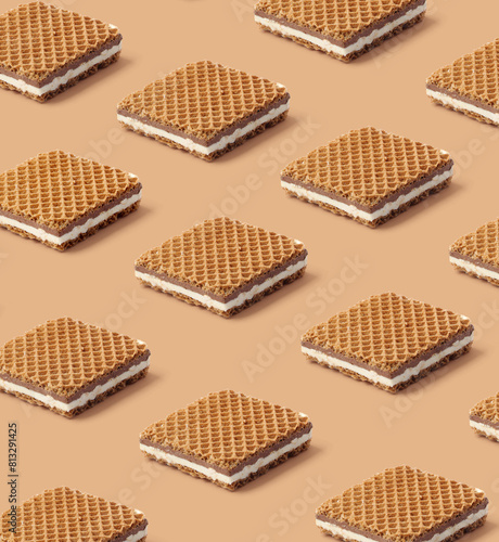 Creative layout made of waffles on the beige background. Food concept. Macro concept. (ID: 813291425)