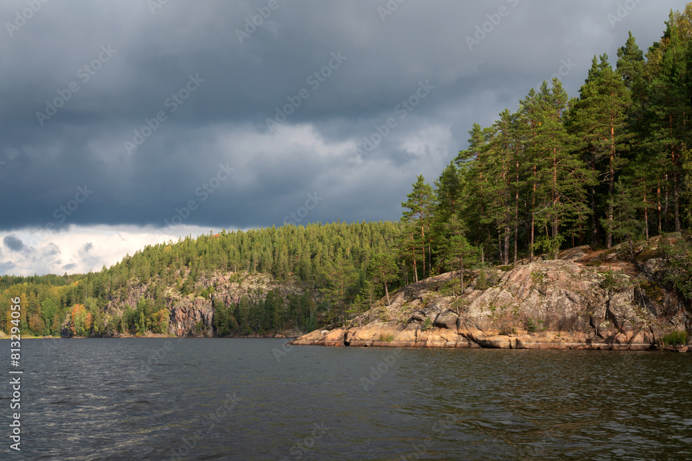 Lake Ladoga near the village Lumivaara on a sunny autumn day, Ladoga skerries, Lakhdenpokhya, Republic of Karelia, Russia Lake Ladoga near the village Lumivaara on a sunny autumn day, Ladoga skerries, Lakhdenpokhya, Republic of Karelia, Russia