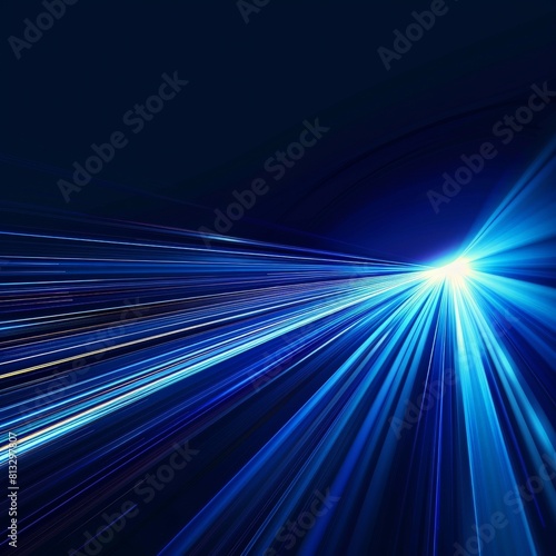 Abstract image of blue and white light streaks on a dark background.